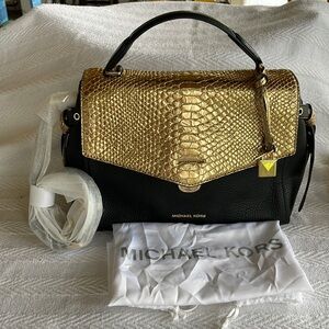 Michael Kors black and gold handbag